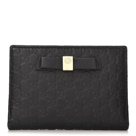 gucci train pass case|GUCCI Microguccissima Bow Train Pass Case Black.